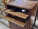 a wooden table with a drawer on top of it