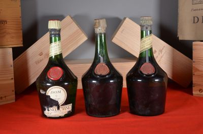 three bottles of wine sitting on a table next to each other