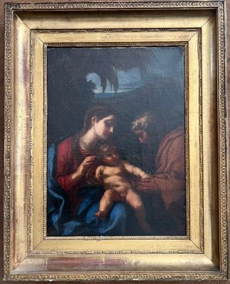 une image représentant un tableau sur lequel figure un homme tenant un bébé dans ses bras