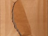 an image of a piece of cardboard with a hole in it