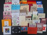 a lot of books that are on the table