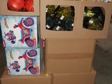 a cardboard box with a bunch of boxing gloves on top of it