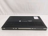 an open laptop computer sitting on top of a white surface