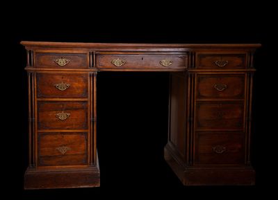 an antique wooden desk with drawers and drawers on top of it