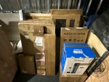 many boxes stacked on top of each other in a storage area