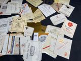many different types of wine labels on a table