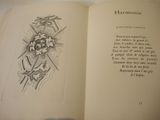 an open book with a drawing of a cross on it