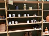 many shelves with various items on them in a store