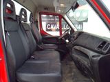 a red truck with black seats in the back of it