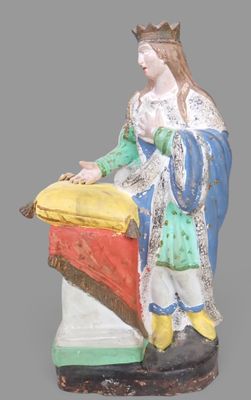 statue représentant une femme tenant un panier et portant une couronne sur la tête