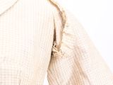 a close up of a woman ' s shirt and tie