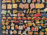 a picture of a magnet board with many different pins on it