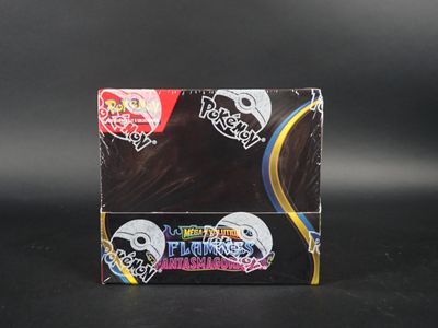 une boîte de chocolats décorée d'un motif représentant un crâne