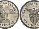 a close up of a coin with an eagle on it