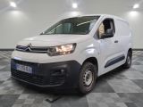 the white van is parked on a checkered floor in a room