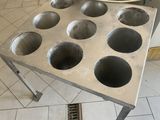 an image of a table with a bunch of muffins on it