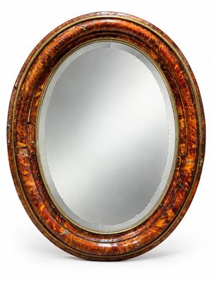 une image représentant un miroir rond sur fond blanc
