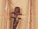 a picture of a wooden frame with a clock and a pair of scissors