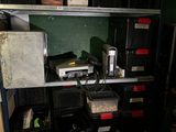 many bins and boxes on the shelves in the room