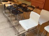 a lot of chairs that are lined up in a row