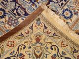 a close up of a rug with a leather handle on it