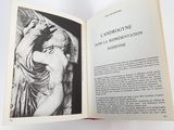 an open book with a picture of a statue on it