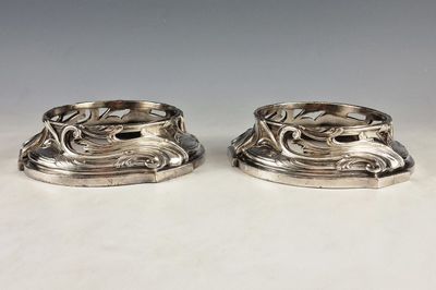 pair of antique silver plated candlestick holders