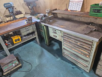 a workbench with a lot of tools on it