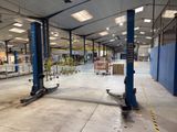 a large warehouse with a lot of equipment inside of it