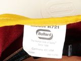 a close up of a purse with a tag on it