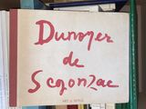 a box full of books with a sign that says dupper de sognone