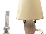 a lamp that is next to a lamp that is on a table