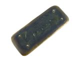 a piece of metal that has a green patt on it