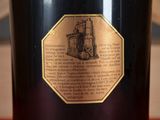 a close up of a bottle of wine on a table