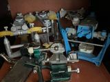 a lot of tools that are sitting on a shelf