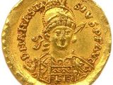 une pièce d'or portant l'image d'un homme
