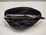 a black and white bag with a hair dryer in it