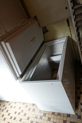 an image of a kitchen with a refrigerator in it