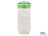 an image of a baby bottle with a green lid
