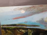 a painting on the wall of a room with a painting on the wall