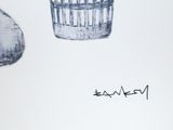 a drawing of a bird in a cage next to a bird in a cage