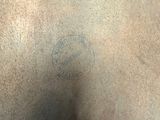 a close up of a person with a tattoo on their back