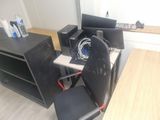 a desk with a chair and a computer monitor on it