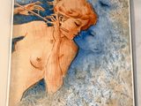 la photo d'un livre sur lequel figure la photo d'une femme
