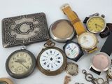 many different types of watches and watches on the table