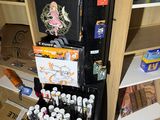 a refrigerator with many different items on it in a room