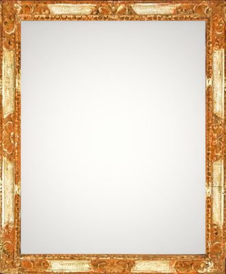 an ornate gold framed mirror with a white background