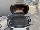 a grill that has a grill on top of it