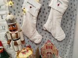 a display of christmas decorations on a table in front of a calendar