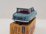 a blue toy car sitting on top of a box